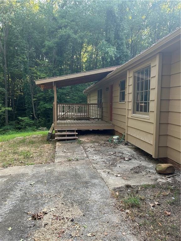 view of home's exterior with a deck