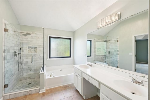 full bathroom featuring vaulted ceiling, a shower stall, a sink, and a bath