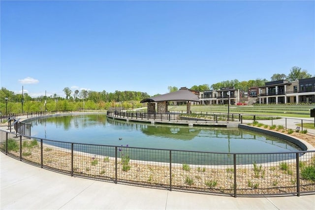 property view of water with fence