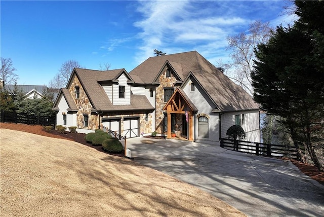 english style home with a garage