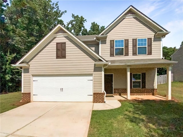 craftsman inspired home featuring a porch and a front lawn