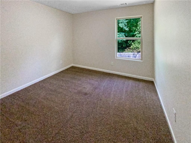 spare room with carpet flooring