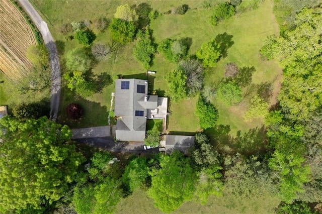 birds eye view of property with a rural view