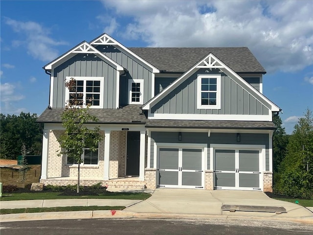 craftsman house with a garage