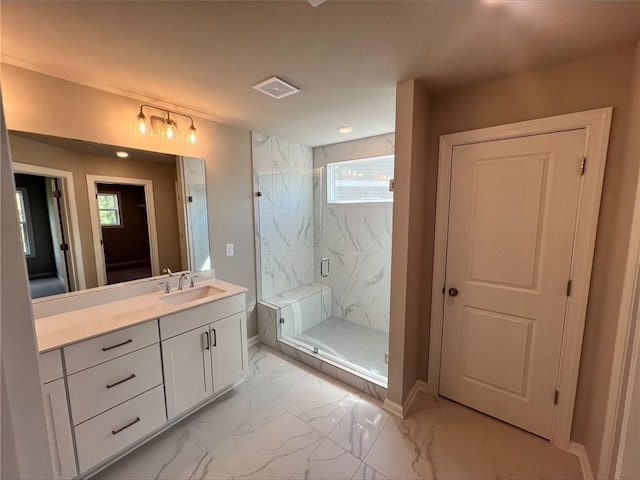 bathroom with vanity and walk in shower