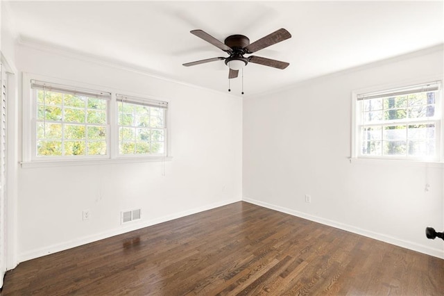 unfurnished room with ceiling fan and dark hardwood / wood-style flooring