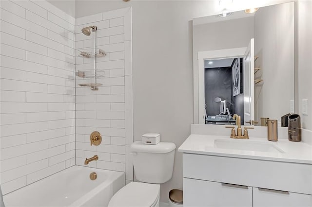 full bathroom featuring toilet, vanity, and tiled shower / bath combo