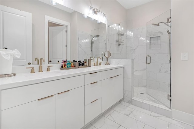 bathroom featuring walk in shower and vanity