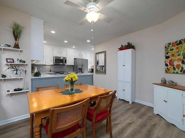 4601 Gann Xing SW, Smyrna, GA 30082 - dining room with recessed lighting, wood finished floors, and ceiling fan