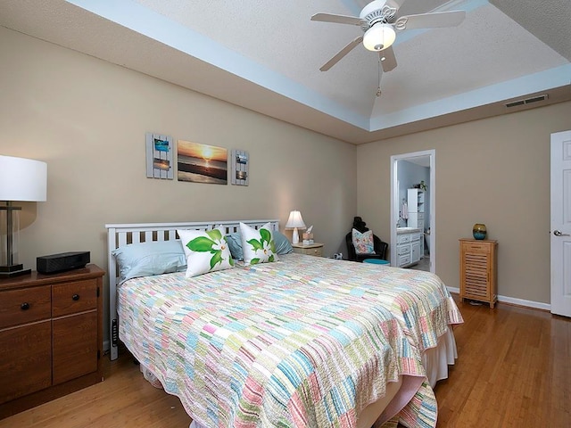 4601 Gann Xing SW, Smyrna, GA 30082 - bedroom featuring wood finished floors and a ceiling fan