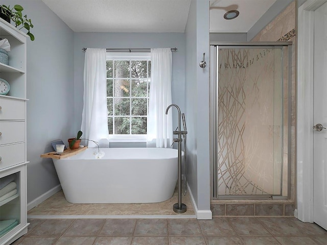 4601 Gann Xing SW, Smyrna, GA 30082 - full bathroom featuring a soaking tub, a shower stall, and tile patterned flooring
