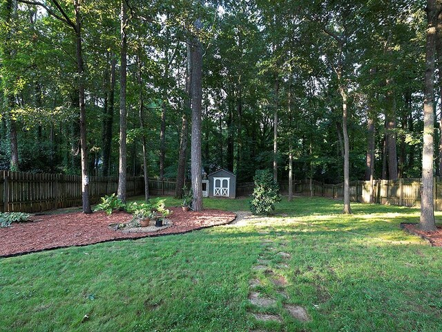 4601 Gann Xing SW, Smyrna, GA 30082 - fenced backyard featuring a shed