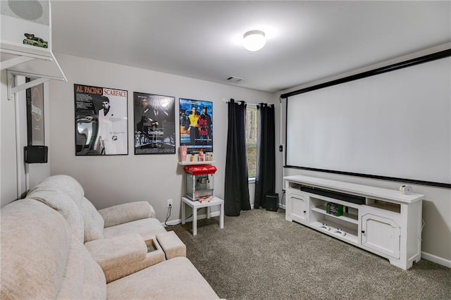 carpeted cinema room with baseboards