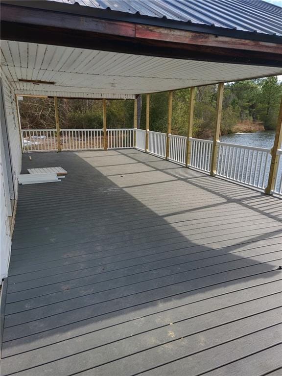 deck featuring a water view