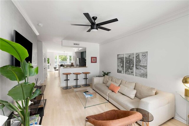 951 Glenwood Ave SE Unit 1805, Atlanta, GA 30316 - living room with light wood-type flooring, a ceiling fan, and crown molding