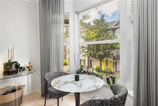 951 Glenwood Ave SE Unit 1805, Atlanta, GA 30316 - dining space with ornamental molding and wood finished floors
