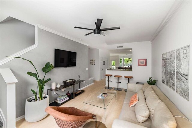 951 Glenwood Ave SE Unit 1805, Atlanta, GA 30316 - living room featuring wood finished floors, crown molding, and ceiling fan