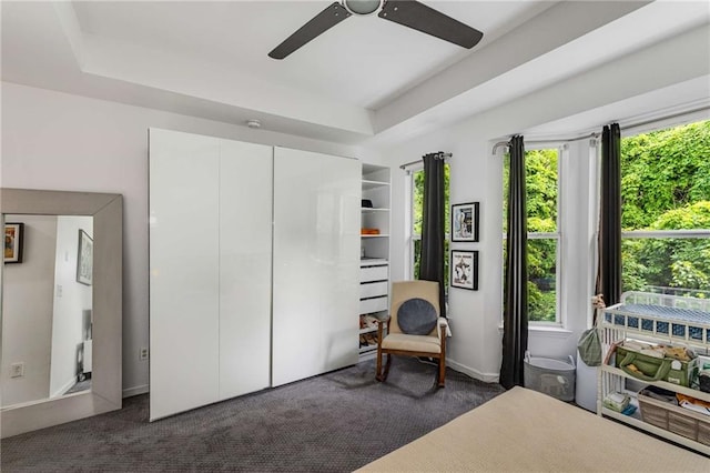 951 Glenwood Ave SE Unit 1805, Atlanta, GA 30316 - bedroom featuring multiple windows, a raised ceiling, carpet, and ceiling fan