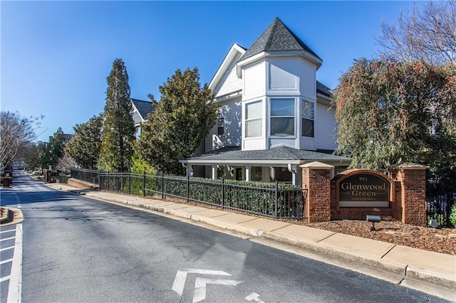 951 Glenwood Ave SE Unit 1805, Atlanta, GA 30316 - view of front of home featuring fence and a shingled roof