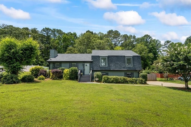 110 Village Ct, Woodstock, GA 30188 - view of front of home featuring a chimney and a shingled roof