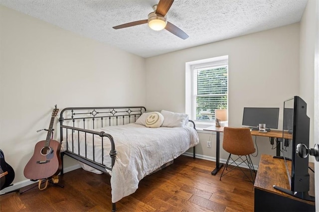110 Village Ct, Woodstock, GA 30188 - bedroom with wood finished floors, a textured ceiling, ceiling fan, and an office area