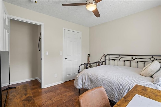 110 Village Ct, Woodstock, GA 30188 - bedroom featuring wood finished floors, a textured ceiling, and ceiling fan