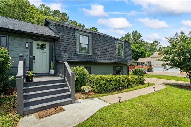 110 Village Ct, Woodstock, GA 30188 - view of front facade with roof with shingles, a front yard, and mansard roof