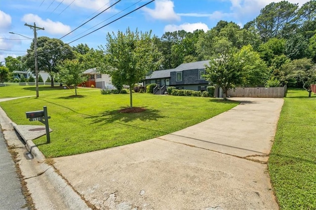 110 Village Ct, Woodstock, GA 30188 - view of yard featuring concrete driveway