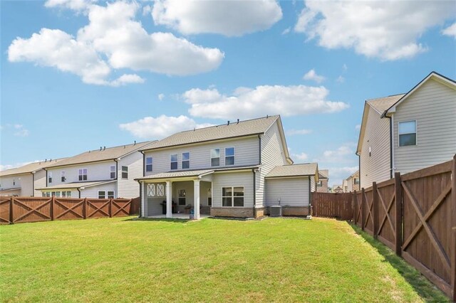 66 Cottontail Ln, Loganville, GA 30052 - back of property featuring a patio area and a residential view
