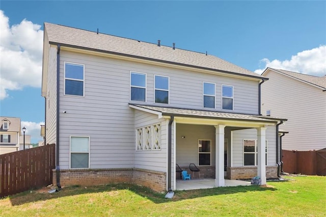 66 Cottontail Ln, Loganville, GA 30052 - back of house featuring brick siding and a patio area
