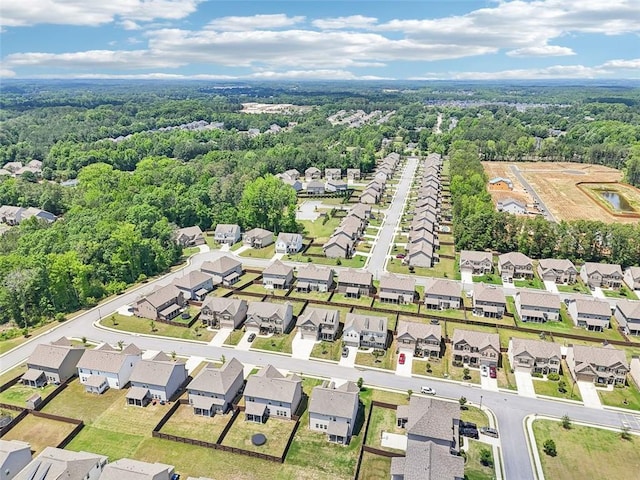 66 Cottontail Ln, Loganville, GA 30052 - aerial perspective of suburban area with a forest