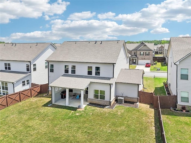 66 Cottontail Ln, Loganville, GA 30052 - back of house featuring roof with shingles, a patio area, a residential view, central air condition unit, and a gate