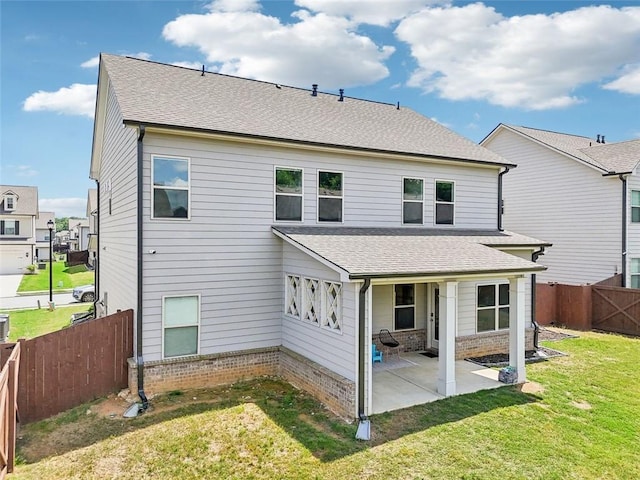 66 Cottontail Ln, Loganville, GA 30052 - back of property with a patio area and a shingled roof