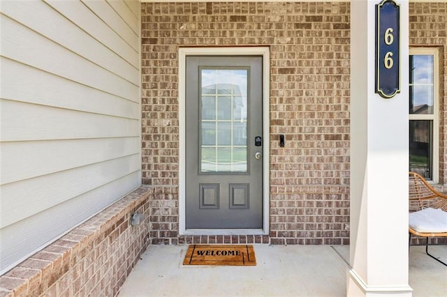 66 Cottontail Ln, Loganville, GA 30052 - doorway to property with brick siding