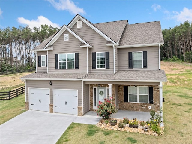 31 Village Trce, Rydal, GA 30171 - traditional-style house featuring a shingled roof, concrete driveway, an attached garage, a porch, and brick siding