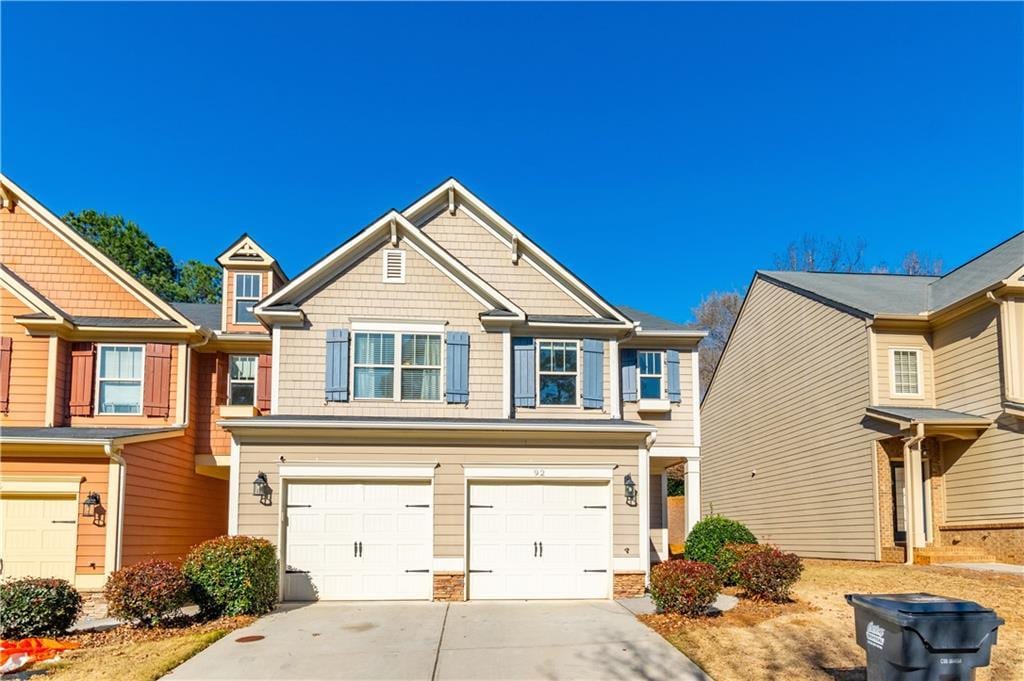 view of front of property with a garage