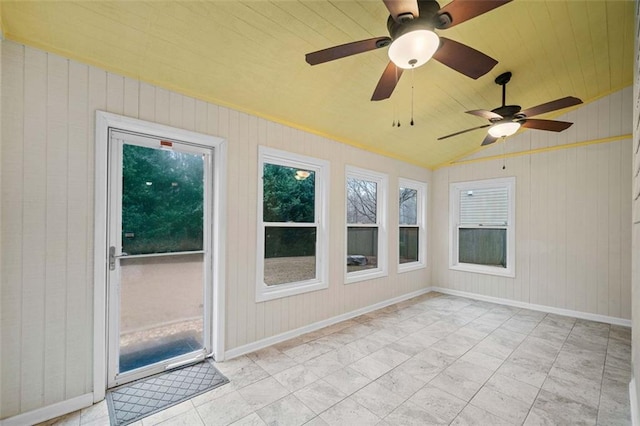 unfurnished sunroom with lofted ceiling and wooden ceiling