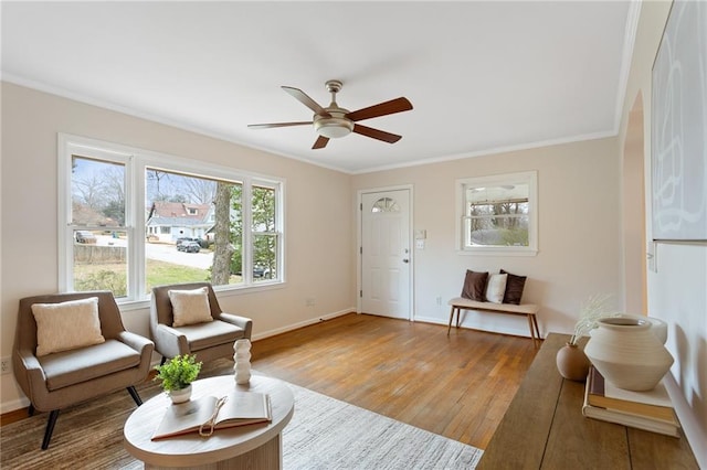 sunroom / solarium with ceiling fan