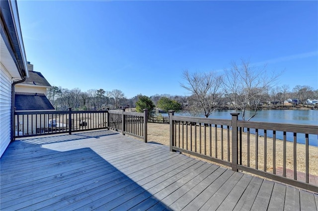 wooden terrace with a water view