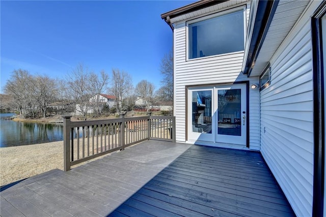 deck featuring a water view