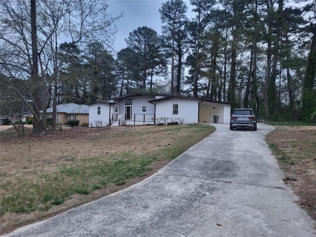 view of property exterior featuring a yard