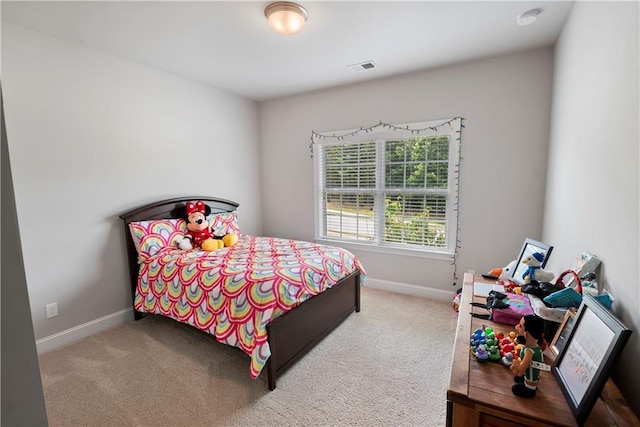 bedroom featuring carpet