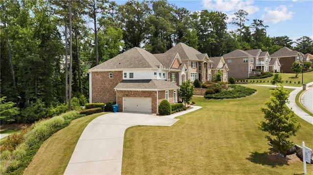 view of front of house featuring a garage and a front yard