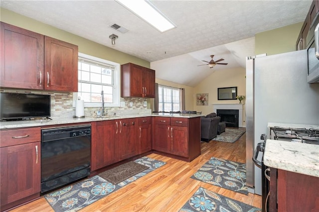 3090 Perch Ln SW, Marietta, GA 30008 - kitchen with dishwasher, a sink, ceiling fan, light wood-type flooring, and a textured ceiling