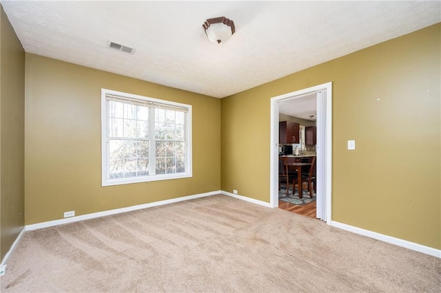 3090 Perch Ln SW, Marietta, GA 30008 - carpeted spare room featuring baseboards