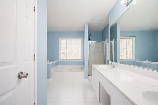 3090 Perch Ln SW, Marietta, GA 30008 - bathroom featuring a shower stall, a bath, double vanity, and baseboards