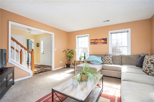 3090 Perch Ln SW, Marietta, GA 30008 - living room featuring stairs, baseboards, and carpet floors