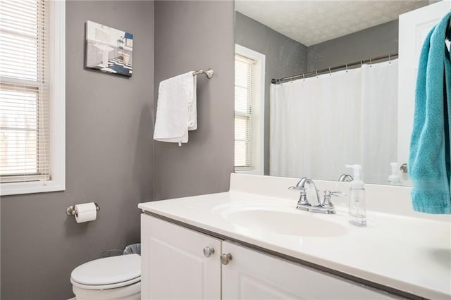 3090 Perch Ln SW, Marietta, GA 30008 - full bathroom featuring vanity, toilet, and a shower with shower curtain