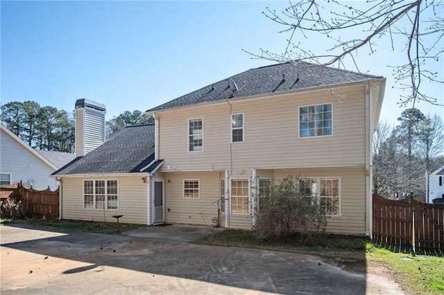3090 Perch Ln SW, Marietta, GA 30008 - back of house featuring a chimney