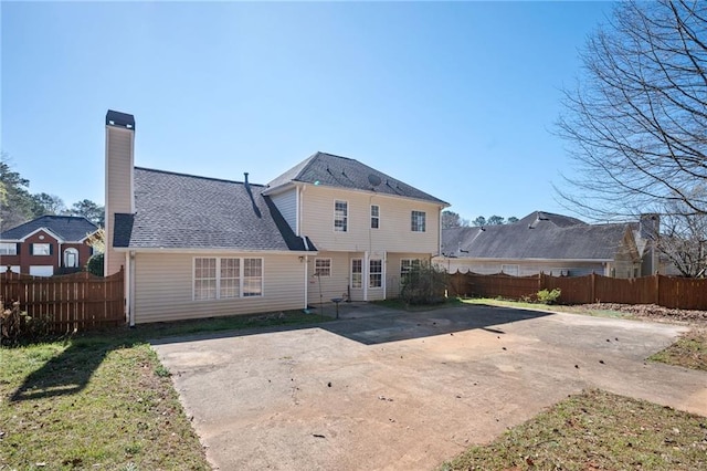 3090 Perch Ln SW, Marietta, GA 30008 - rear view of property with a patio and a chimney